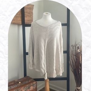 The limited Women's Beige Solid Round Neck Fringed Poncho Sweater Size XS